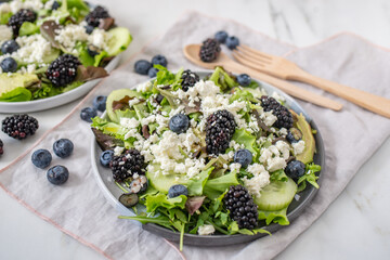 healthy summer salad with berries and feta cheese