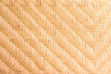 Abstract background of brown woven bamboo, Asian handicrafts, natural materials, products. Sustainability concept.