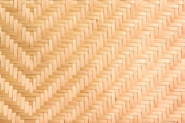Abstract background of brown woven bamboo, Asian handicrafts, natural materials, products. Sustainability concept.
