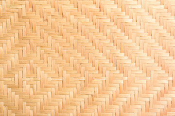 Abstract background of brown woven bamboo, Asian handicrafts, natural materials, products. Sustainability concept.