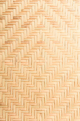 Abstract background of brown woven bamboo, Asian handicrafts, natural materials, products. Sustainability concept.