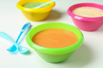 Concept of baby food on white background