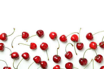 Naklejka na ściany i meble Sweet red cherry berries on white background