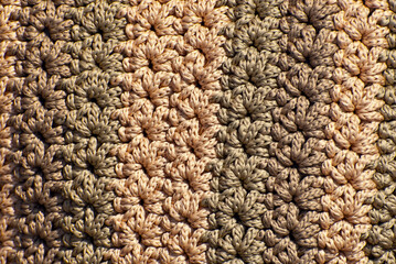 Texture of wicker products. Coarse wool thread closeup.