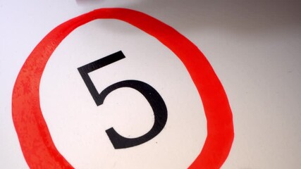 5 Marking the date in the calendar with a red marker. The fifth day of the month. A time limit or deadline is a narrow field of time, a particular point in time, by which a task must be accomplished