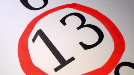 13 Marking the date in the calendar with a red marker. The thirteenth day of the month. A time limit or deadline is a particular point in time, by which an objective or task must be accomplished