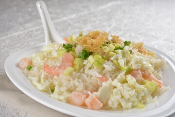 chinese style egg fried rice with japanese sakura shrimp and prawn seafood meat in white background asian halal menu