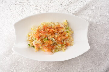 chinese style egg fried rice with japanese sakura shrimp and prawn seafood meat in white background asian halal menu