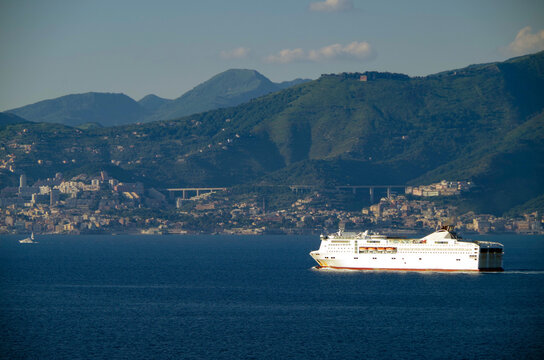Modern Mediterranean passenger ferry cruiseship cruise ship liner in sailing towards port of Genova, Italy
