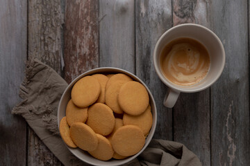 cup of coffee with cookies