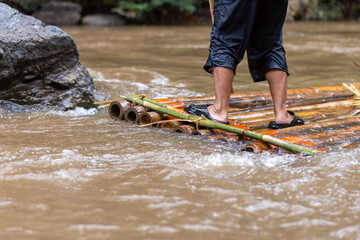 bamboo raft in the river Transportation of rural villagers in the forest, no roads, various uses of bamboo.