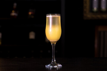 Mimosa cocktail on a bar counter in a nightclub