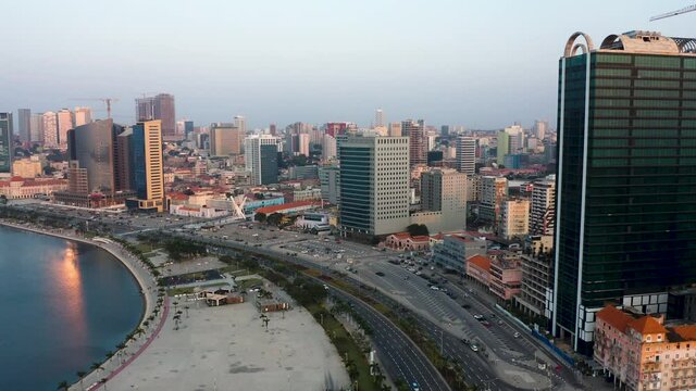 Traveling front, Luanda city, golden hour flying over Luanda bay, Africa #5