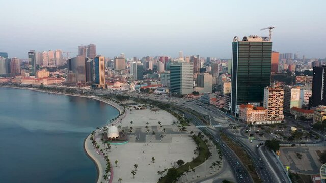 Traveling front, Luanda city, golden hour flying over Luanda bay, Africa #4