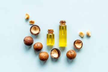 Macadamia essence oil with macadamia nuts. Organic product for food or cosmetic