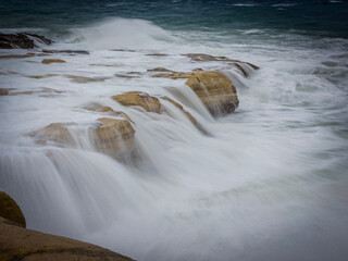 water flowing over rocks