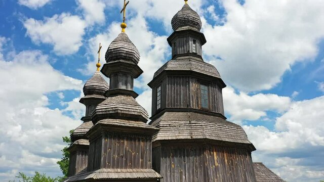 Rural landscape flying around the old wooden church.