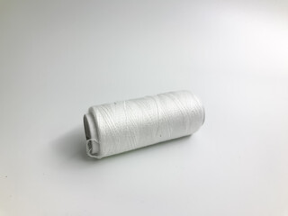white thread isolated on white background
