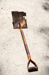 Rusty old broken close-up.A broken shovel.