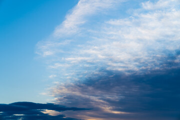 Beautiful clear blue sky with different clouds. Daytime sky