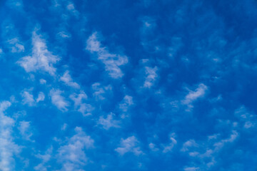 Beautiful blue sky with light clouds. Daytime sky