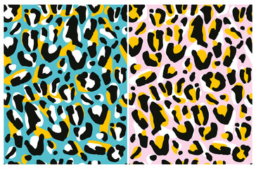Abstract Leopard Skin Seamless Vector Patterns. White, Yellow and Black Irregular Brush Spots on a Pink and Blue Backgrounds. Abstract Wild Animal Skin Design. Simple Wild Cat Fur Print.