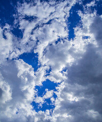 bright blue sky with white fluffy clouds