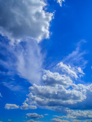bright blue sky with white fluffy clouds