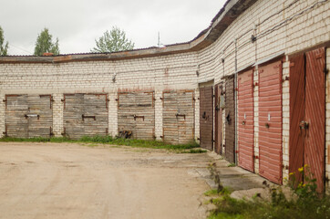 Car garages on the outskirts of the residential area, Kuldiga, Latvia.