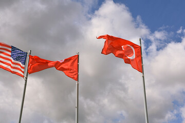 flags of the world against blue sky