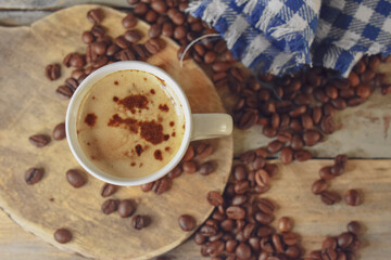 Coffee beans on wooden Close Up 