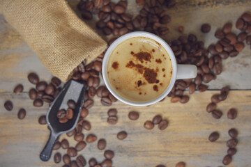Coffee beans on wooden Close Up 