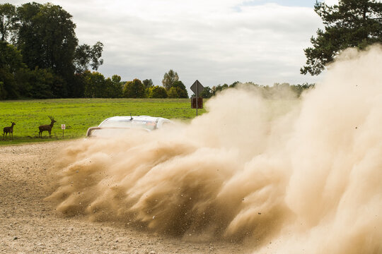 Kuldiga, Latvia - September 17, 2016: FIA ERC Liepaja Rally. Rally Car And Dust Cloud.