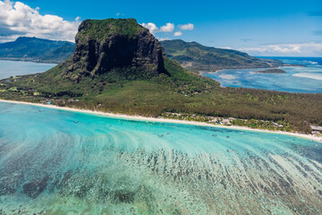Tropical island with Le Morne mountain, blue ocean and coastline in Mauritius. Aerial view