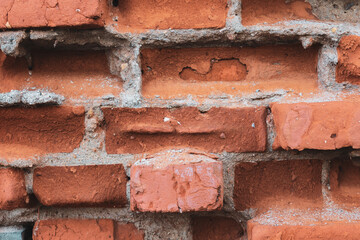 Red old brick wall texture. Damaged brown background