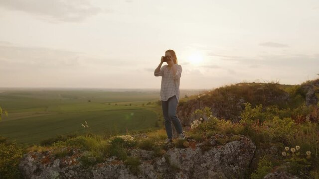 Girl catches the beautiful view on our land
