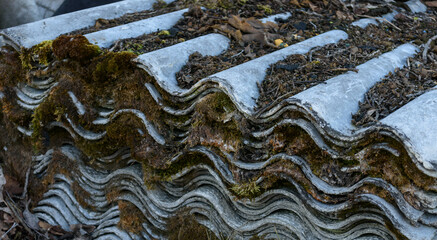 old texture slate overgrown with moss, stacked