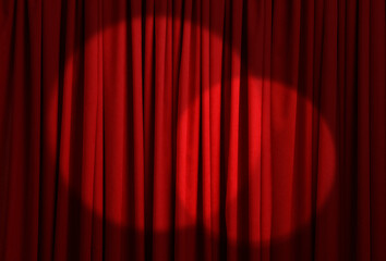 Spotlights illuminating closed red stage curtains. Start of performance