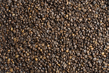 background of a scattering of natural coffee beans