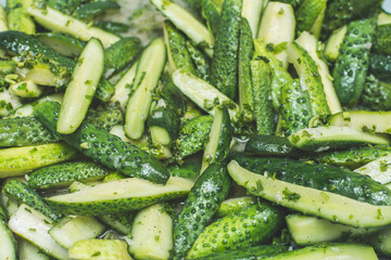 Cucumber salad in its own juice. pickled for packaging in jars for long-term storage