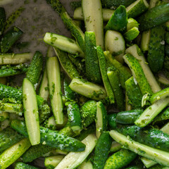 Cucumber salad in its own juice. pickled for packaging in jars for long-term storage