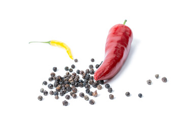 red hot peppers and dried peppercorns on a white background