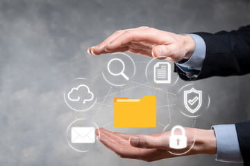 Document Management System DMS .Businessman hold folder and document icon.Software for archiving, searching and managing corporate files and information.Internet Technology Concept.Digital security