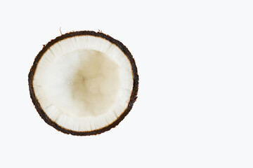 Half of Coconut top view on white background