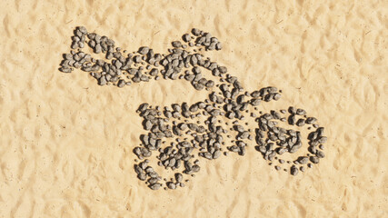 Concept conceptual stones on beach sand handmade symbol shape, golden sandy background, motorcycle stuntman sign. 3d illustration metaphor for sport, adrenaline, extreme competition, danger and fun