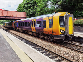 Fototapeta na wymiar Passenger Diesel powered Train at platform England UK
