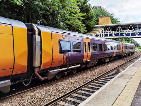 Passenger Diesel powered Train at platform England UK