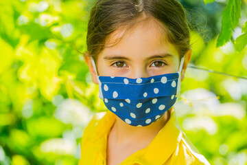 Little girl with mask