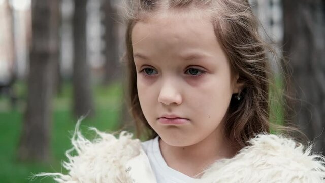 sweet little preschool girl crying. upset unhappy child. extra slow motion.