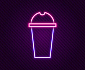 Glowing neon line Milkshake icon isolated on black background. Plastic cup with lid and straw. Colorful outline concept. Vector